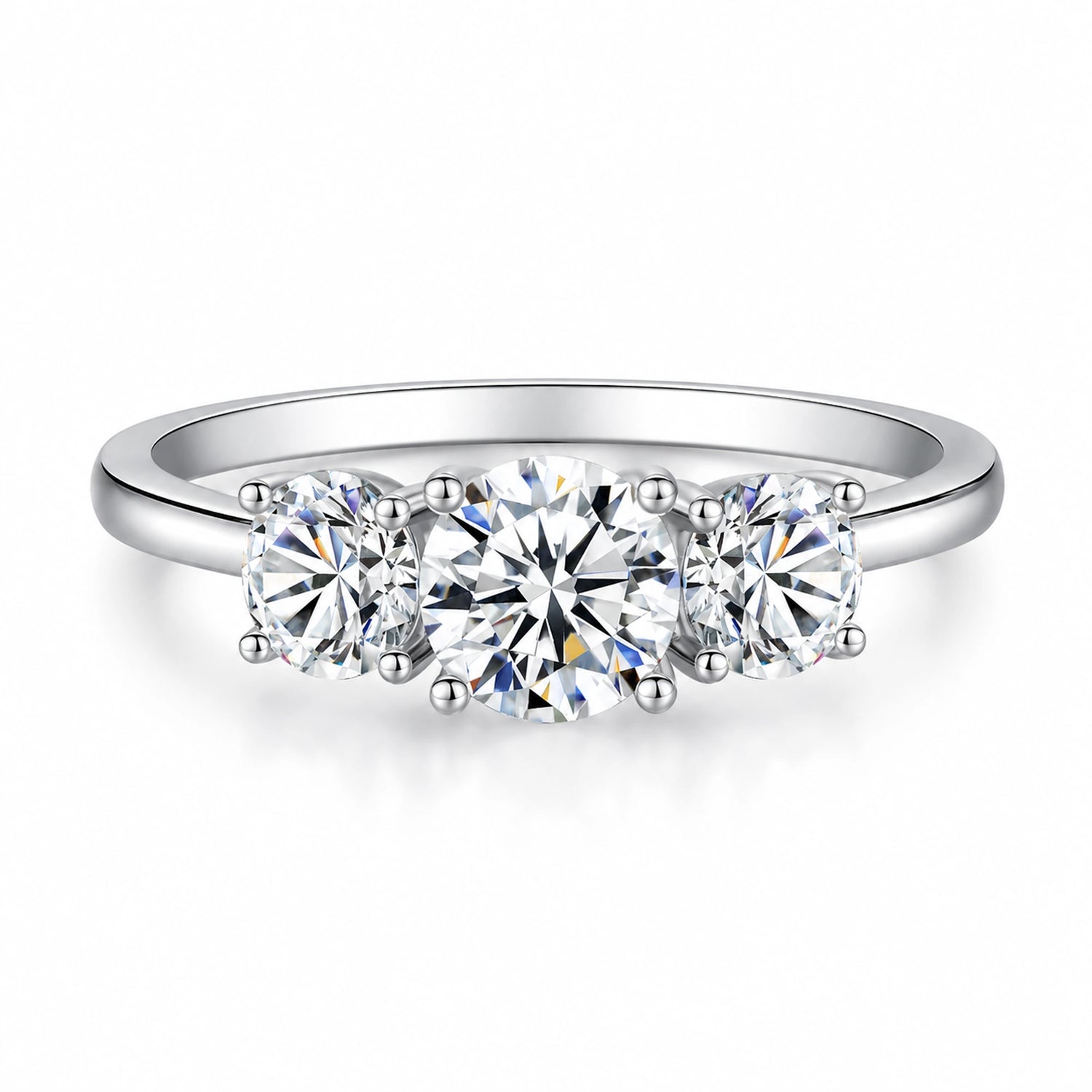 Round moissanite three-stone engagement ring front view in silver