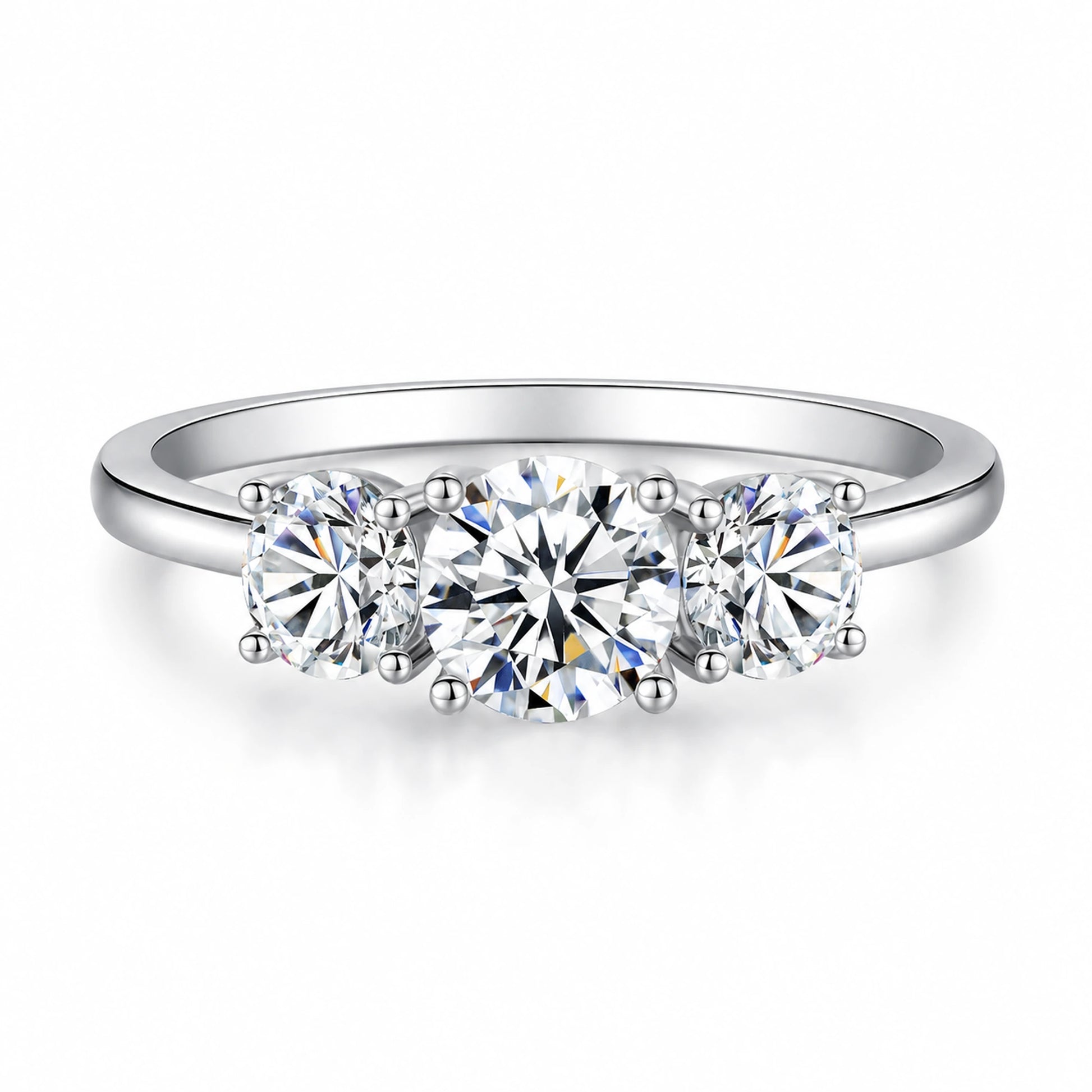 Round moissanite three-stone engagement ring front view in silver