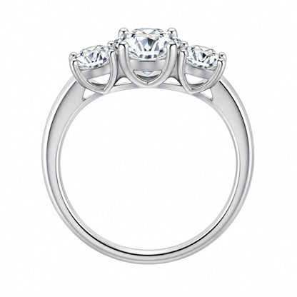 Round moissanite three-stone engagement ring side profile showing prong setting